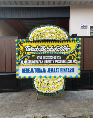 Papan Bunga Duka di Niela